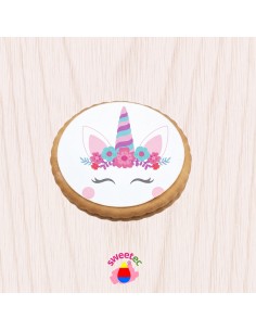 6.5cm chocolate biscuit with edible print of a unicorn with floral decoration, on a clean white background. Ideal for unicorn-th